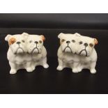 Pair of Beswick Bulldog groups modelled in a seate
