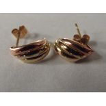 Pair of 9 carat gold earrings