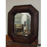 Octagonal faux leather framed mirror