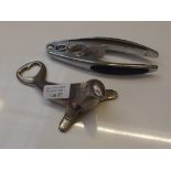 Novelty can opener together with a pair of nutcrac