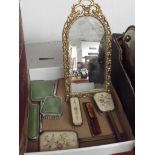 Two dressing table sets together with an easel bac