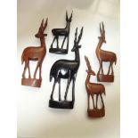 5 carved African antelopes