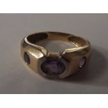 9 carat gold dress ring set with three amethyst, s