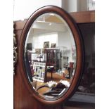 Edwardian bevel edge wall mirror set in a beaded f