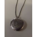 Silver photograph locket and silver chain with fol