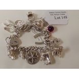 Silver charm bracelet with 14 charms