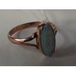 9 carat rose gold dress ring with carved blue ston