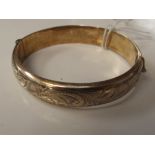 Silver hallmarked bangle, gilded with engraved dec