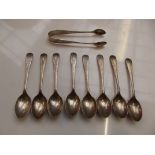 Set of eight Edwardian silver teaspoons with accom