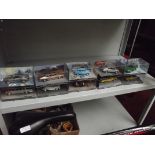 10 boxed collectable cars, to include 007