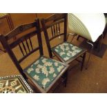 Pair of Edwardian oak hall chairs