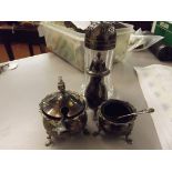 Silver three piece cruet set to together with a su