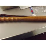 Truncheon with turned handle