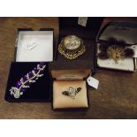 Collection of four vintage brooches