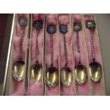 Six boxes of continental silver souvenir spoons, a