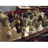 Large collection of Buddhas and others, some ivory