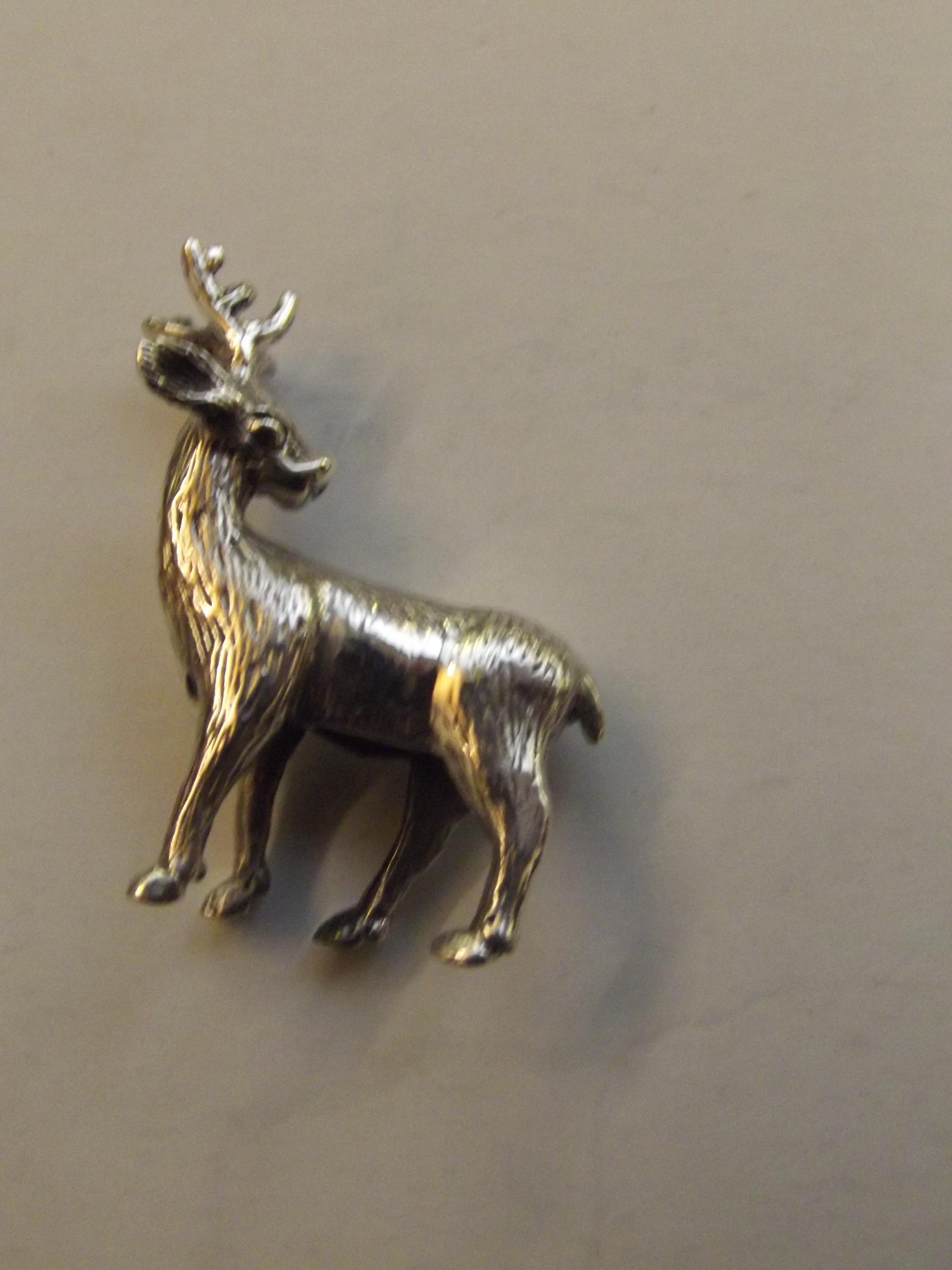 Silver stamped reindeer animal