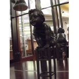 Bronze child on stool signed, Juan Clara