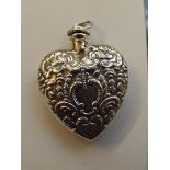 Silver stamped embossed scent bottle