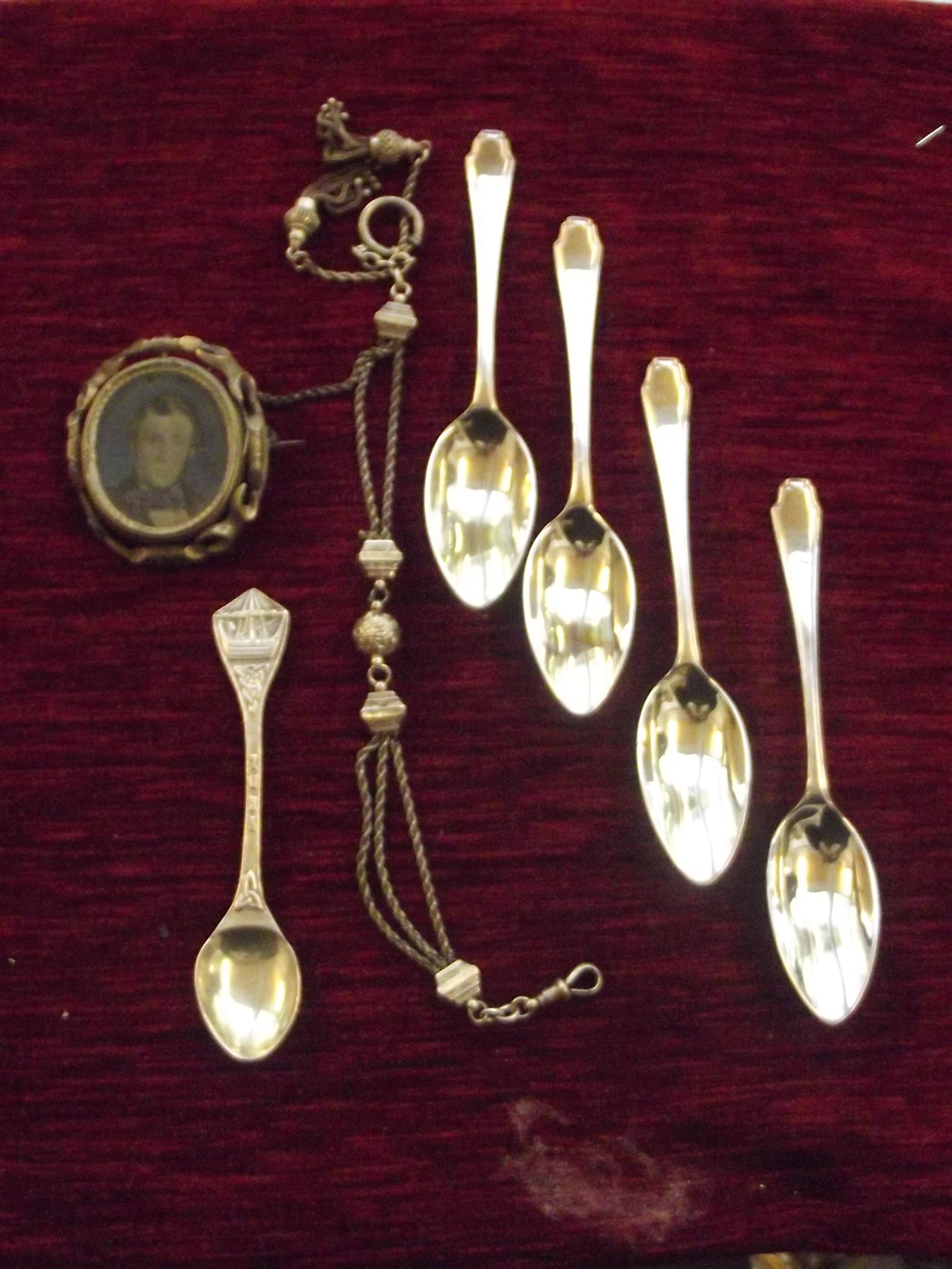 Collection of white metal items