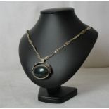 A 9ct gold fancy link necklace with large hardstone fob