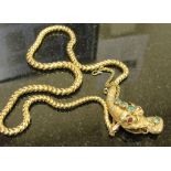 A Victorian high carat gold snake necklace, set with emeralds,