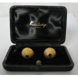 A cased pair of Kutchinsky gold and sapphire cufflinks