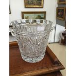 A cut glass ice bucket