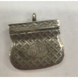 A William IV novelty silver vinaigrette in the form of a purse: Birmingham 1832: maker 'GW'