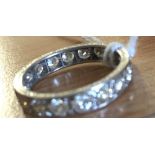 An 18ct diamond full eternity ring