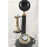 A modern candlestick telephone