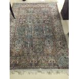 An Indian silk rug: 7m x 5m