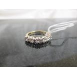 A 9ct CZ half eternity ring