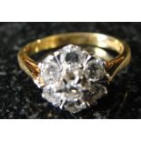 An 18ct diamond daisy ring