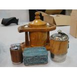 An oak pipe rack, tobacco jar,