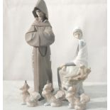 Five pieces of Lladro: a monk,