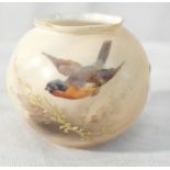 A Royal Worcester blush ivory vase depicting birds flying