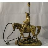 A spelter lampbase in the form of a cavalier on horseback