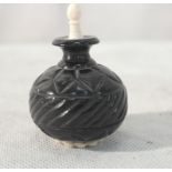 A Chinese coromandle snuff bottle with ivory top