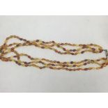 A three-strand amber necklace