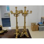 A pair of early 20th century gilt Neo-Classical-style candlesticks