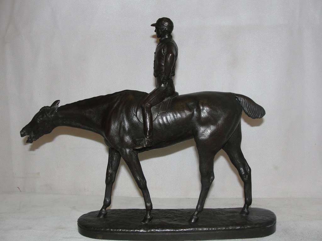 A bronze figure of a horse and jockey; together with one other bronze of a horse