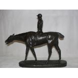 A bronze figure of a horse and jockey; together with one other bronze of a horse