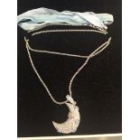 A Swarovski moon-shaped necklace