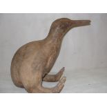 A terracotta kiwi by a Swedish artist