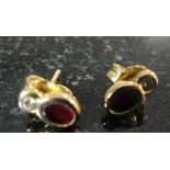 A pair of 18ct diamond and ruby earrings by Mappin & Webb