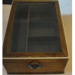 A 19th century glass-topped mahogany sewing box