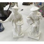 A pair of Royal Worcester blanc-de-chine Japanese style figures,