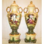 A pair of lidded urns on bases depicting with floral scenes
