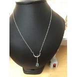 A diamond and aquamarine drop pendant necklace